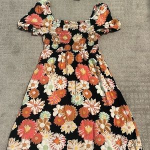 This is a cute summer dress. It is soft and very cute!